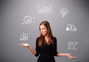 beautiful young woman standin and juggling with statistics and graphs beautiful young woman standin and juggling with statistics and graphs